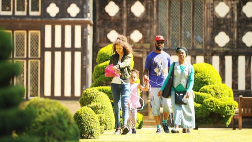 A family in the garden at Rufford Old Hall, Lancashire